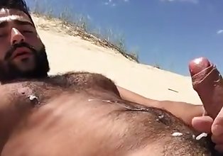 Hairy Greek Jerks Off at the Beach
