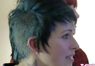 Inked transgirl straponfucked by redhead babe