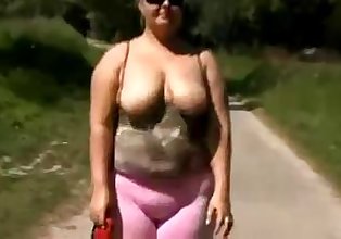 Chubby Lady fucks herself in Public
