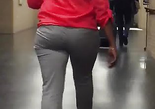 Amazing booty milf in grey dress pants