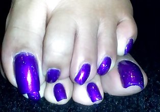 Purple long toenail