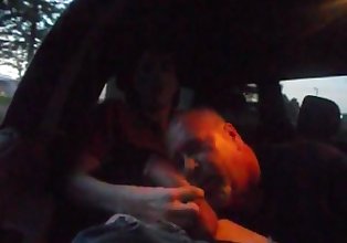 Older Gives Younger Blowjob in Car