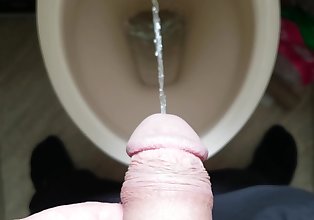 Pulling back my foreskin and pissing