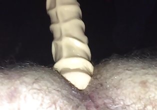 Ass gets worked over in sling with dildo
