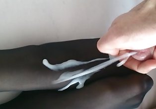 German black nylon feet cumshot in slow motion. Izola from DATES25.COM