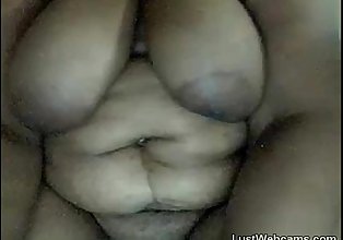 Ebony BBW sucks dildo on webcam