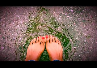 Jasmine plays in the rain barefoot!