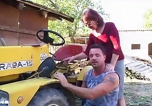 Redhead granny fucked in the back yard
